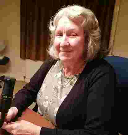 Picture of Jane Volunteer at the microphone